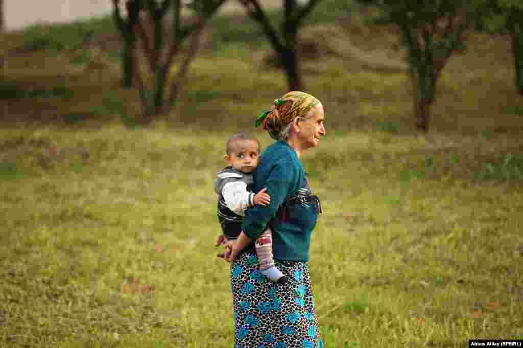 With parents working in the fields, child-care duties often fall to the grandparents. 