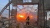 A firefighter works at a site that was hit amid Russian drone attacks in Ukraine's Odesa region on September 4.