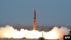 A Shaheen 1A nuclear-capable, surface-to-surface ballistic missile is launched from an undisclosed location in Pakistan in December 2015.