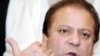 Former Prime Minister Nawaz Sharif speaks to reporters in Islamabad