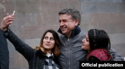 Supporters take a selfie with Prime Minister Karen Karapetian at an election campaign meeting in the village of Tegh on March 10.