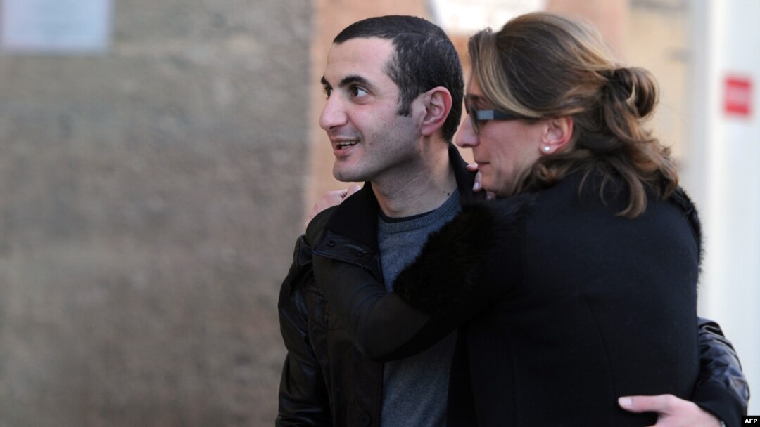 Former Georgian Defense Minister David Kezerashvili (left) embraces his wife, Sophia, as he leaves a prison in Marseille on February 3.
