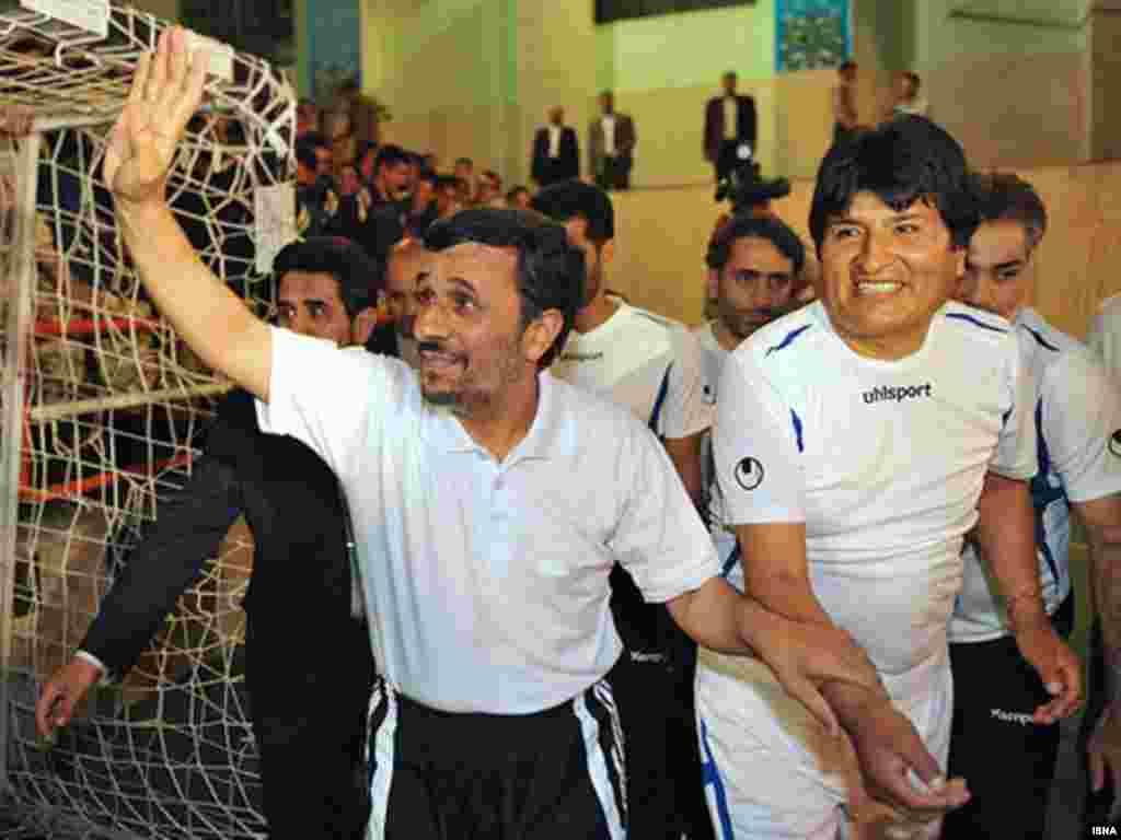 Iran's President Mahmud Ahmadinejad (left) and his Bolivian counterpart Evo Morales play a game of soccer in Tehran on October 27.Photo by ISNA