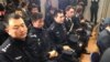 Ofițeri de poliție chinezi participă la o conferință a ministrului italian de interne, Angelino Alfano, pe 2 mai 2016, la Roma. Din acel an, polițiștii chinezi au început să patruleze împreună cu ofițeri italieni, la Roma și Milano, în cadrul unui experiment de câteva săptămâni.