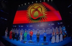 Дүйнө чемпионатында Кыргызстандын гимни жаңырып жаткан учур. Нур-Султан шаары. 19-сентябрь, 2019-жыл.