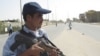 An Iraqi police officer on patrol in Karbala today