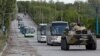 «Ազովստալ»-ից գերի հանձնված ուկրաինացի զինվորականներին տեղափոխող շարասյունը, 17-ը մայիսի, 2022թ.