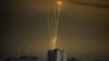 Російські ракети, запущені по території України з Бєлгородської області Росії, які було видно на світанку в Харкові, 20 серпня 2022 року