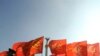 На отдельных участках политического фронта стороны перешли от демонстрации флага к более активным действиям. На фото: прогрессивные социалисты на марше