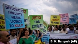 Pakistani protesters in Islamabad stage a rally demanding a trial for the U.S. diplomat involved in a road accident that killed a person.