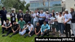 Relatives of victims and former detainees rallied to demand justice near the Almaty prosecutor's office in May.