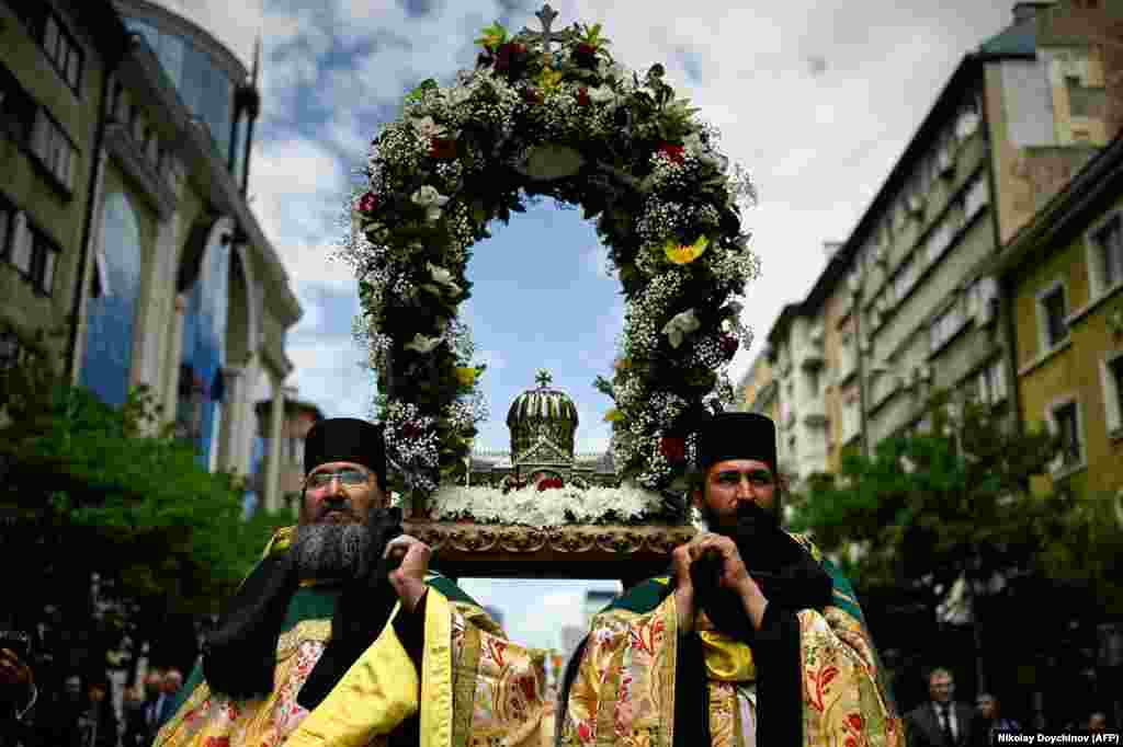 On May 23, central Sofia had a more solemn atmosphere as Orthodox priests paraded this container, carrying what is claimed to be the bones of Cyril and Methodius.