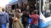 Armenia - People board a public bus in Yerevan, May 25, 2022.