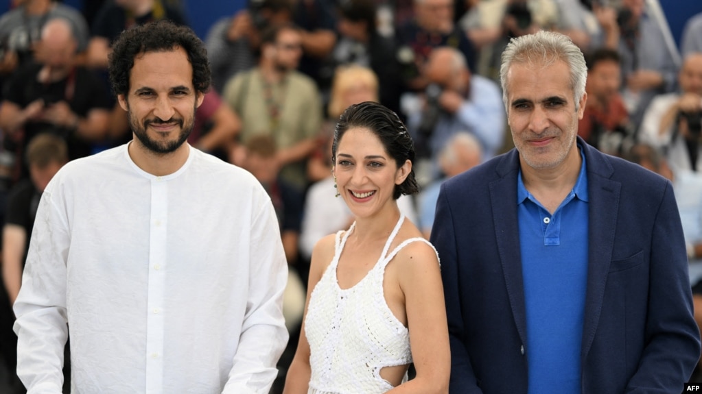 Iranian-Danish director Ali Abbasi, Iranian actress Zar Amir Ebrahimi, and Iranian actor Mehdi Bajestani pose during a photo call for the film Holy Spider at Cannes Film Festival on May 23, 2022. Ebrahimi took home the Best Actress award for her role.
