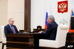 Владимир Путин и Юрий Борисов (кадр из встречи 4 апреля 2022 года)