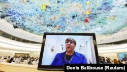  تصویر آرشیف: میشل باچله رئیس کمیسیون حقوق بشر سازمان ملل متحد هنگام سخرانی به اعضای کمیسیون 