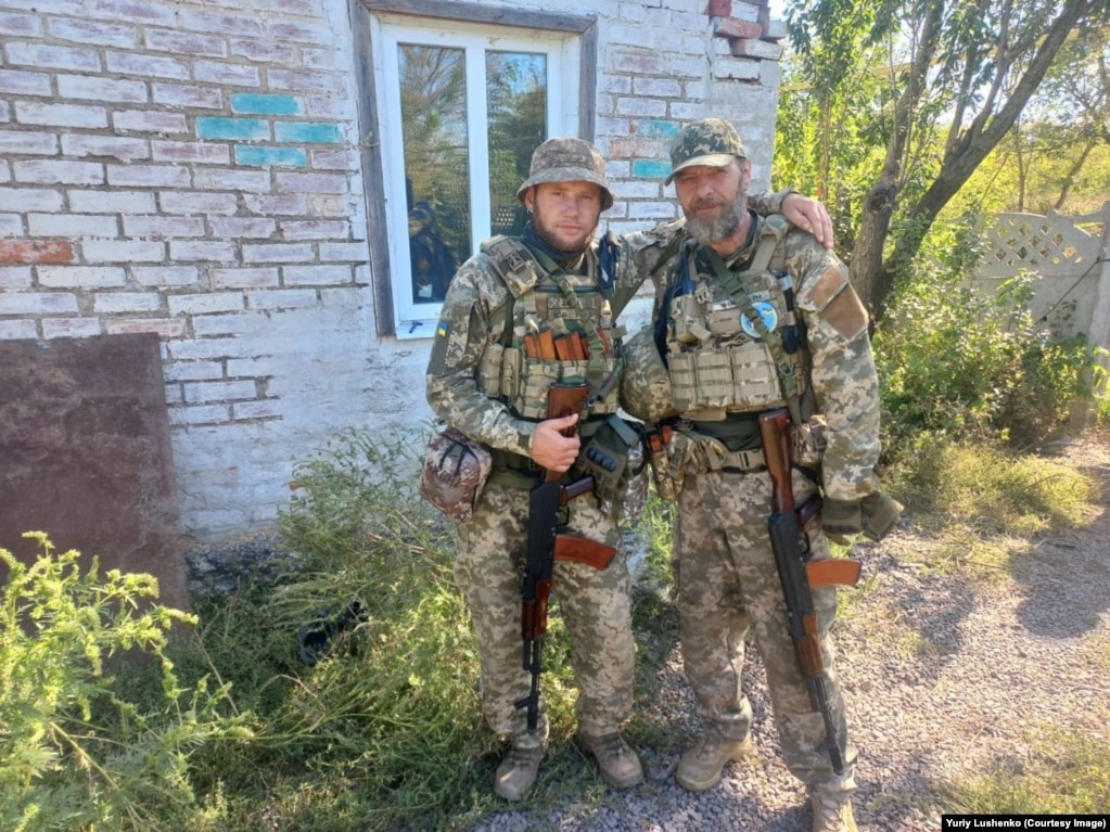 Lushenko (right) during his service in 2023 leading an infantry assault group