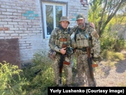 Yuriy Lushenko (right) during his service in 2023 leading an infantry assault group.