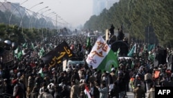 Tens of thousands of supporters of cleric Muhammad Tahir-ul-Qadri gathered at a protest rally in Islamabad on January 15.