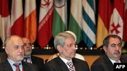 Both Husayn al-Shahristani (left) and Bayan Jabr (center) said spending will have to be cut.