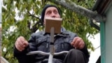 
GRAB Ukrainian Pensioner Beats Blackouts With Pedal Power