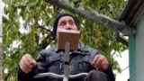 
GRAB Ukrainian Pensioner Beats Blackouts With Pedal Power