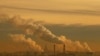 A thermoelectric power station emits smoke in front of the main building of Moscow State University. (file photo)