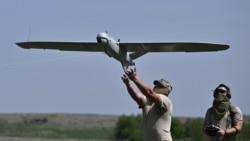 Ukrainian soldiers of the 22nd Brigade launch a Leleka reconnaissance UAV drone near Chasiv Yar on April 27.