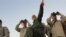 Photos released by Iranian Tasnim News agency shows Iran's Chief of Staff, Major general Mohammad Bagheri, among Iranian forces in Syria's Aleppo, undated.