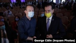 Liberalii caută soluții de urgență pentru a putea desfășura Congresul la Romexpo cu 5.000 de delegați. Imagine cu cei doi candidați pentru șefia partidului: Florin Cîțu și Ludovic Orban, Palatul Parlamentului, 18 septembrie 2021. 