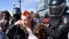 'Bums, Freaks, And Gypsies': How Pro-Kremlin Media Depict The Moscow Protesters