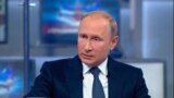 Russia - President Vladimir Putin during televised question and answer session - video screen grab