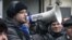 A protester speaks to the crowd at a rally in Kyiv for the release of the last detained "Euromaidan" demonstrator, Yaroslav Prytulenko.