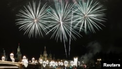 Fireworks light up central Moscow to welcome in New Year's Day.