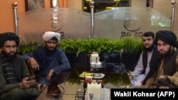 Талибы в кабульском ресторане, 26 августа 2021 года