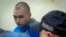 Russian soldier Vadim Shishimarin is seen in court in Kyiv while standing trial for war crimes on May 18.