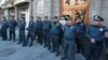 Armenia - Police officers guard a government building during an opposition demosntration in Yerevan, May 19, 2022.