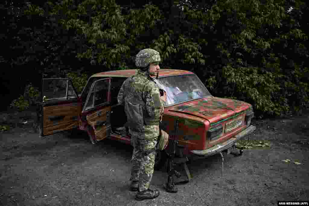 A Ukrainian soldier at a checkpoint.