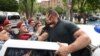 Armenia - Police officers detain opposition supporters during anti-government demonstrations in Yerevan on May 18, 2022. 