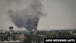 Smoke rises during Russian shelling in the city of Severodonetsk in eastern Ukraine.