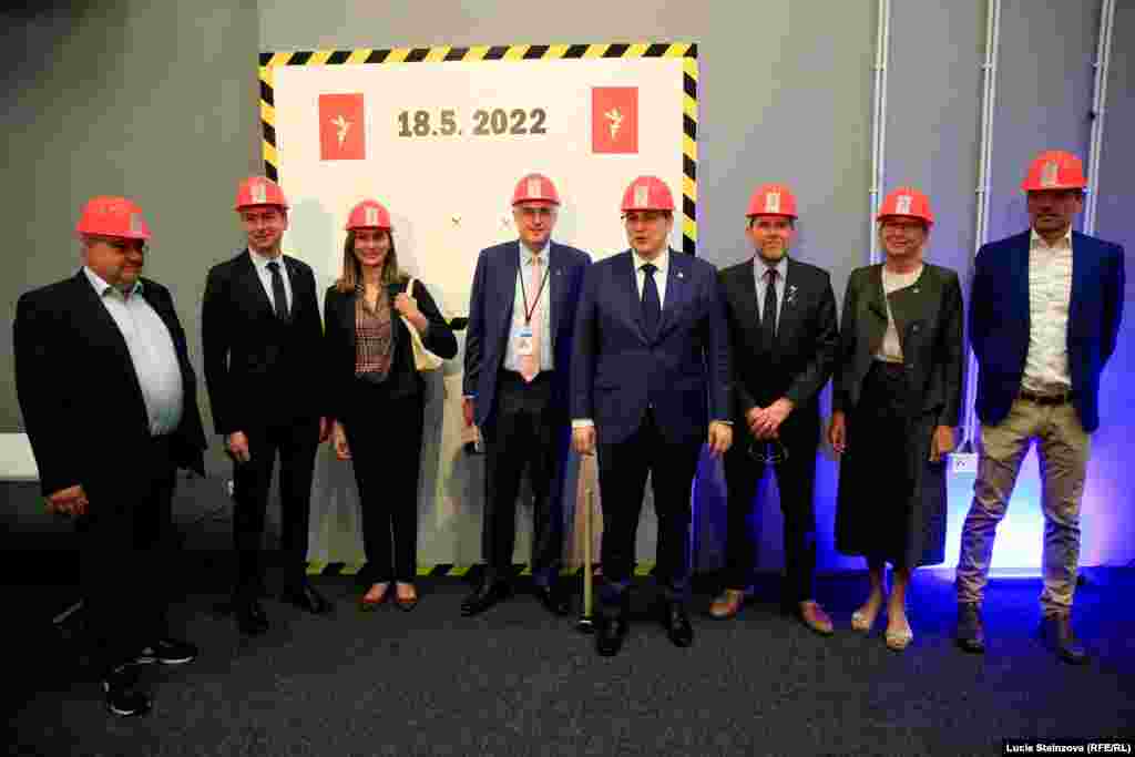 CZECH REPUBLIC -- the ground-breaking event -- Symbolic launch of project (breaking of fake wall, sledge hammers, hard hats) -- Czech FM Jan Lipavsky attends, Prague May 18, 2022