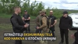 Iskopavanje tela u potrazi za dokazima o zločinima u Ukrajini