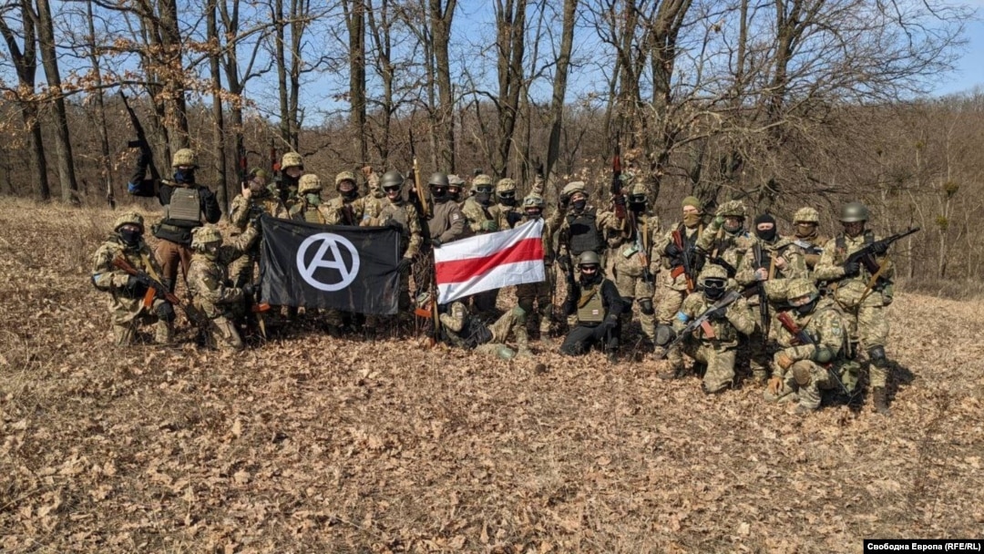 The so-called Macedonian-Bulgarian Foreign Battalion. Bulgarian Defense Minister Dragomir Zakov has said the group's Facebook photos, which include a doctored version of the above image, are fake.
