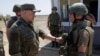 A screenshot from a video released by Russia's Defense Ministry on July 8, showing Sergei Shoigu purportedly inspecting troops in his country's Southern Military District. 