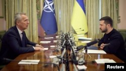 NATO Secretary-General Jens Stoltenberg (left) and Ukrainian President Volodymyr Zelenskiy meet in Kyiv in April.