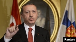 Turkish Prime Minister Recep Tayyip Erdogan was the apparent target of a man carrying a fake bomb. (file photo) 