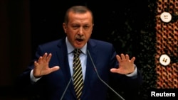 Turkish Prime Minister Tayyip Erdogan has said that a corruption investigation targeting some of his allies is a conspiracy. 