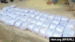 آرشیف، مواد مخدر ضبط شده از سوی پولیس در ولایت کندز. (عکس جنبه تزئینی دارد.)