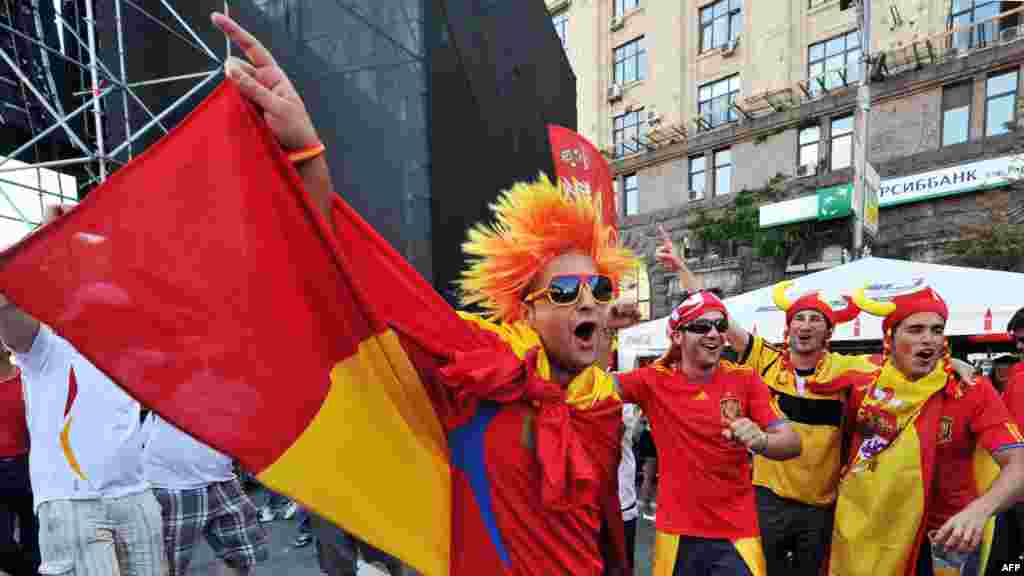 Spanish supporters cheer in the fan zone in Kyiv.