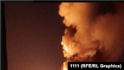 Скрин фотографии из социальных сетей, на которой виден взрыв в Новой Каховке в ночь на 12 июля
